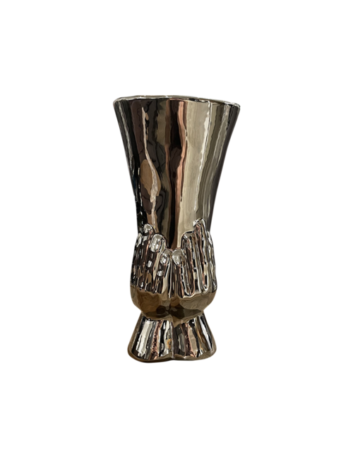 GLOSS SILVER VASE HELD BY HAND AND WRIST