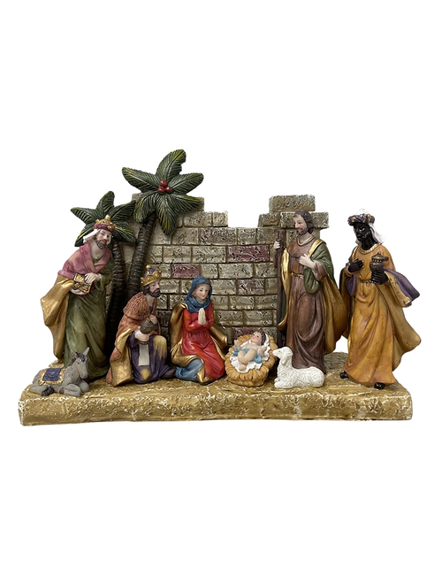 NATIVITY IN FRONT OF GREY STONE WALL