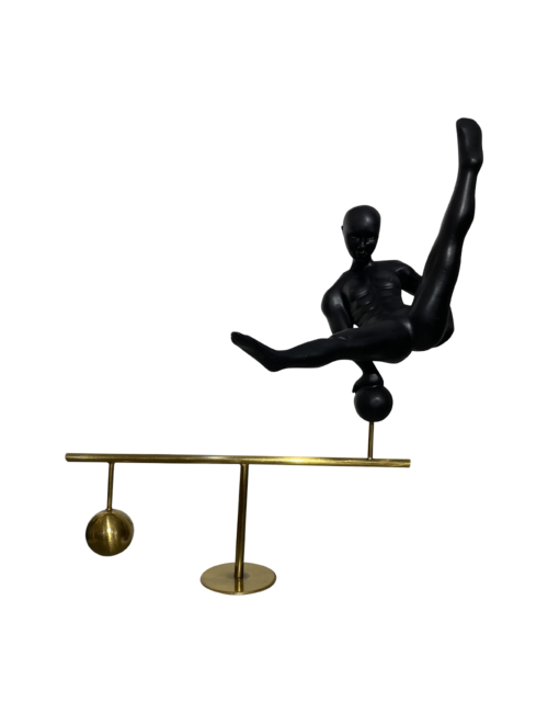 Gymnast on gold bar