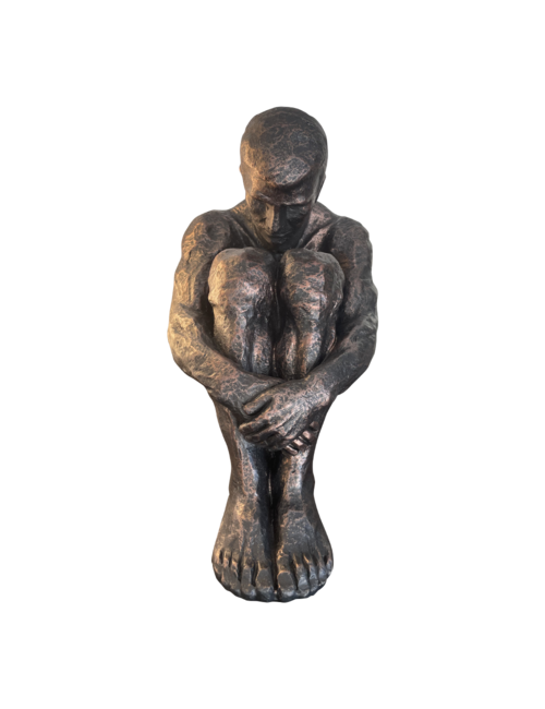 Bronze look sitting man