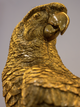 LARGE GOLD PARROT ON STAND